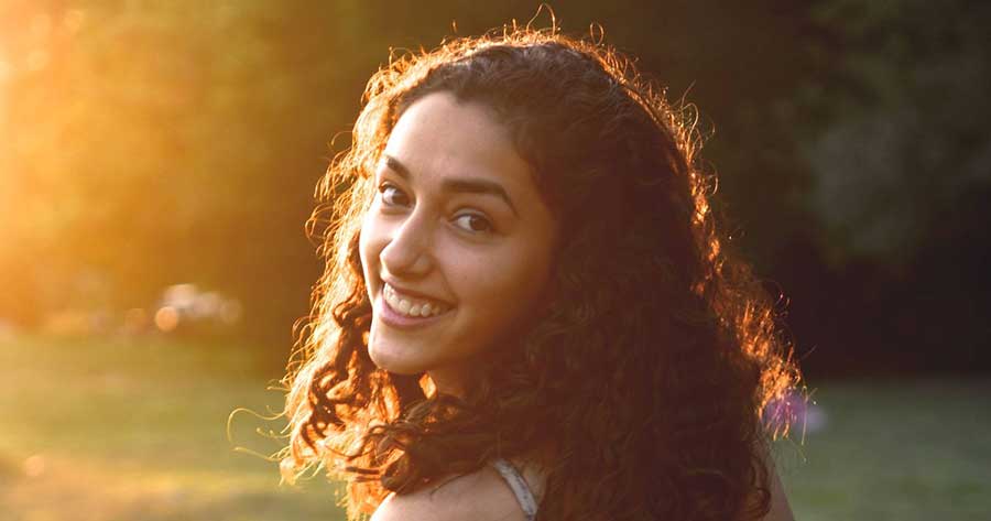 Mexican girl smiling at the camera